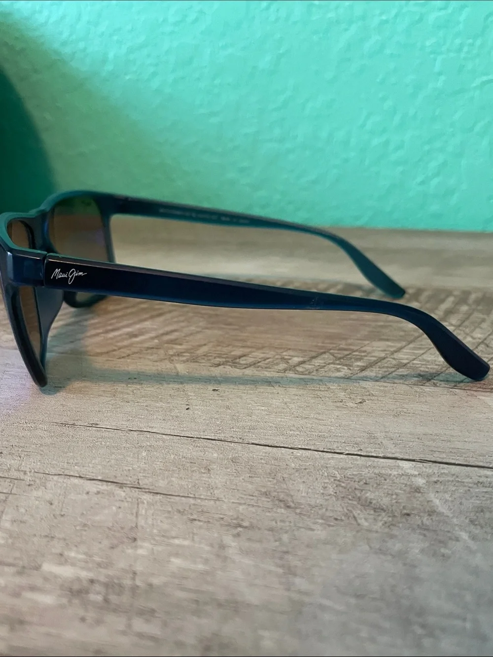 Maui Jim Black Frame Sunglasses with Blue Purple Mirrored Lenses